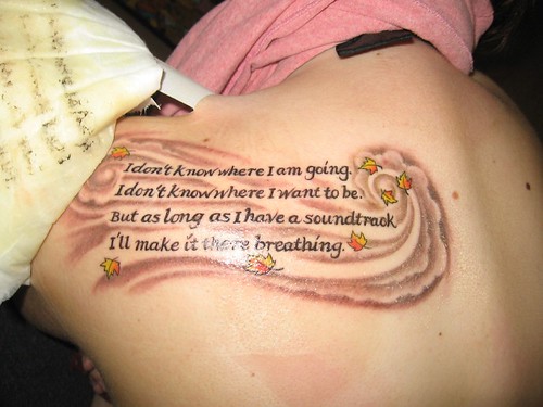 My friend's tattoo with lyrics from the song The Rain by Foreverinmotion.