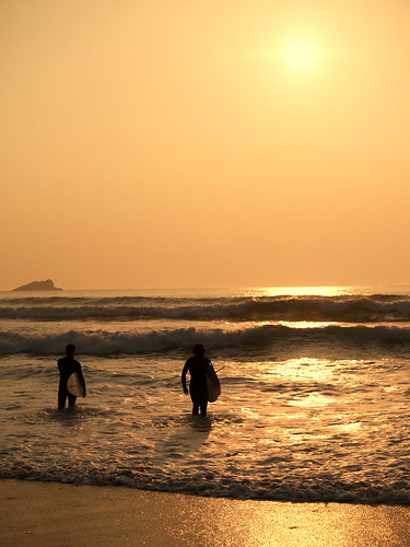 Surfers at Sunset