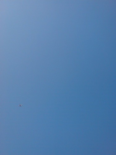 blue sky and an airplane