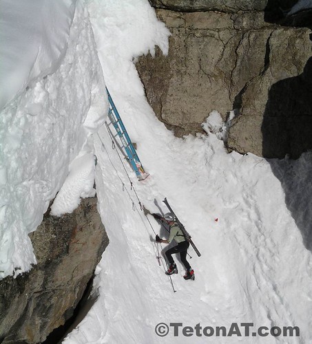 Cary Smith reaches the ladder in Corbet's Couloir