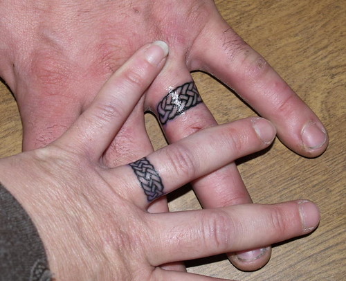 our new wedding rings tattoos 