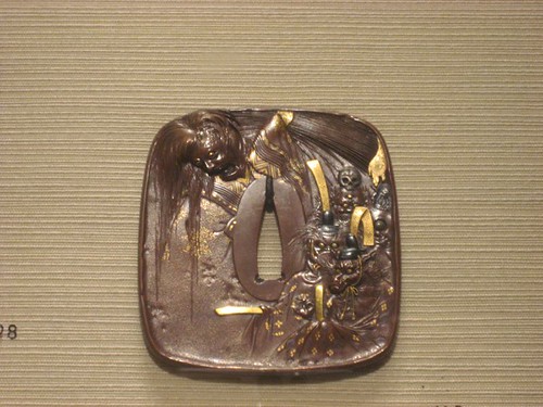 Tsuba with Design of a Female Ghost and Animal-Headed Demons