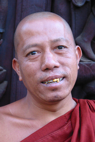 Monk with golden teeths