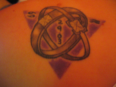 Wedding Tattoo. I love this one. The purple is so lovely.