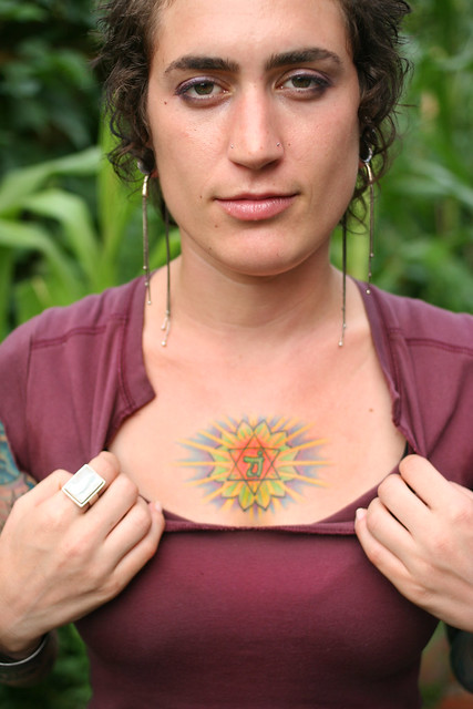 The tattoo is called 'Anahata' and it is of the heart chakra.