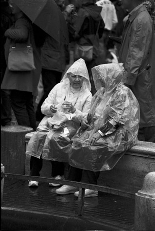 Ladies in raincoats