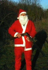 santa  and his gun