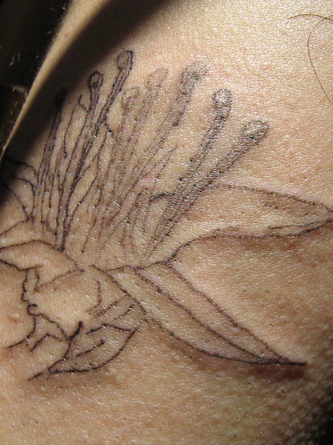 Dean's tattoo - single flower