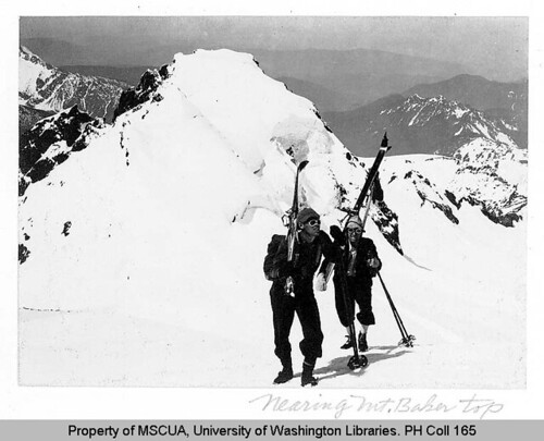 Two skiers on Black Butte spur near Mount Baker summit saddle