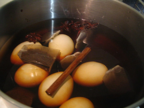 Simmering tea eggs.