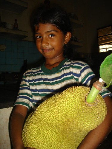 Riza... with a jackfruit by fredericknoronha.