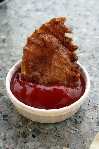 Fry dipped in ketchup