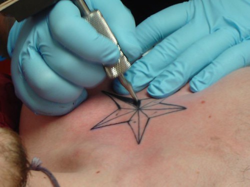 star outline tattoo