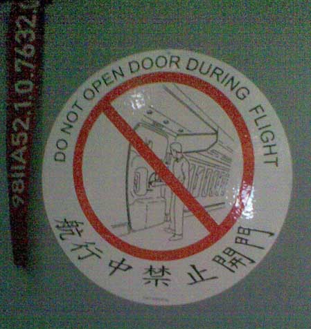 China Air in flight safety sticker on door