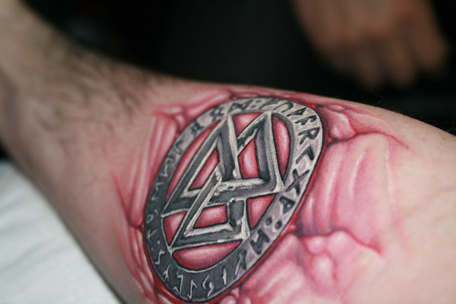Valknot & Runes Tattoo (pic 1). Fresh ink, arm still on the armrest.