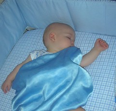 Matthew asleep in his crib