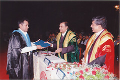 Receiving the diploma from IIM-B chairman Mukesh Ambani as chief guest Nandan Nilekani looks on