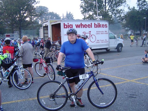 fat guy on bike pic. Fat guy getting ready to ride.