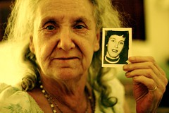 Old woman with a photo
