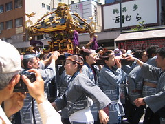 Women carrying portable shrine