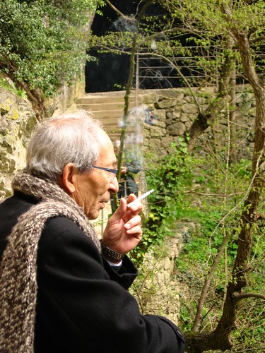 Man smoking outside Škocjanske caves, Slovenia