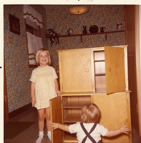 Me, with a cupboard that my grandpa made for my play kitchen - December 1971