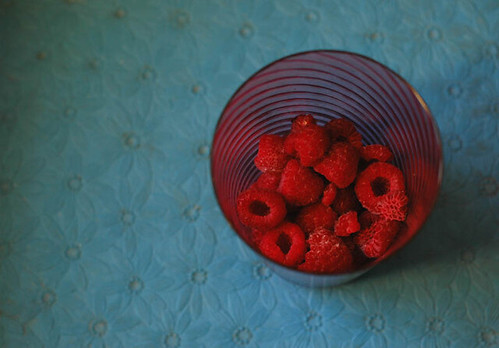 raspberries in glass by simply photo.