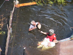 Rescue swimmer prepping survivors for hoist