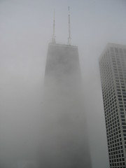 The Hancock Center in clouds