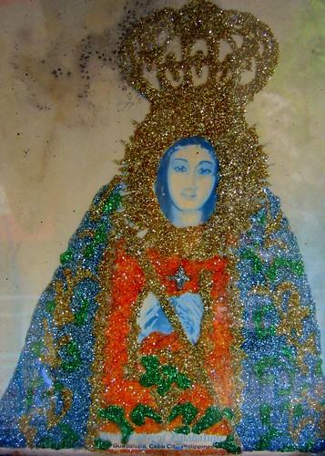 Guadalupe on cardboard