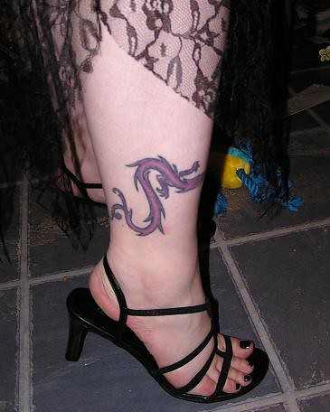Dragon Tattoo On Leg. witch leg - dragon tattoo