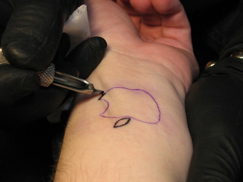 Finally getting my Apple logo tattoo. For those other graphic designers the 