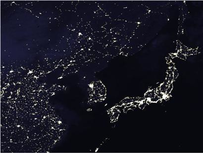 satellite photo of north korea at night. the night lights of North and