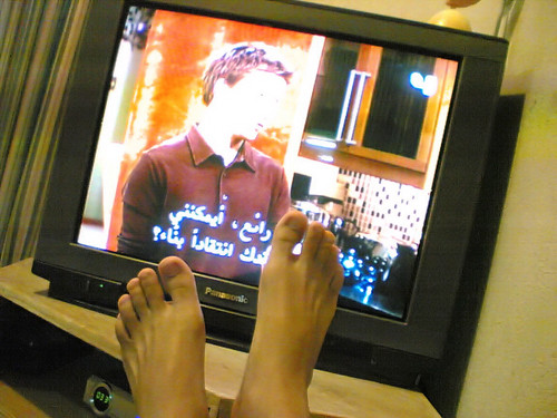 Two feet watching TV