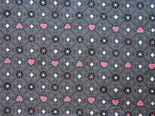 Pink hearts on a gray floral-metric background, from the collection of Bella 