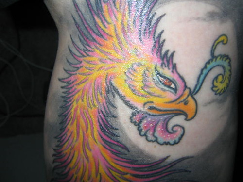 tattoo head. Her Phoenix is pretty tough, but girly, so she likes it.