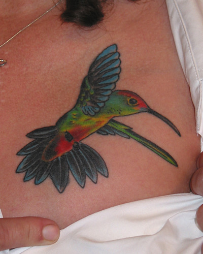 cute colorful hummingbird tattoo design on chest