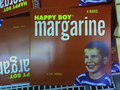 'Happy Boy' brand margarine, with creepy-looking blank-eyed 'smiling' kid on the box