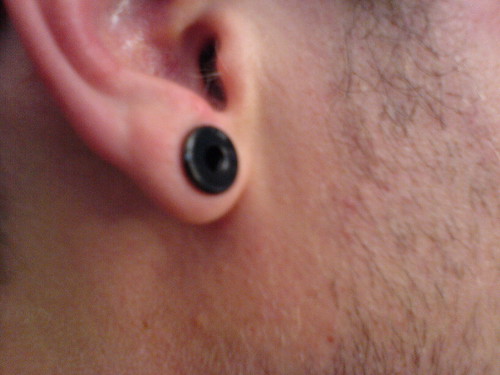 Flesh Tunnel Piercing?? (Not sure if that is the correct term)