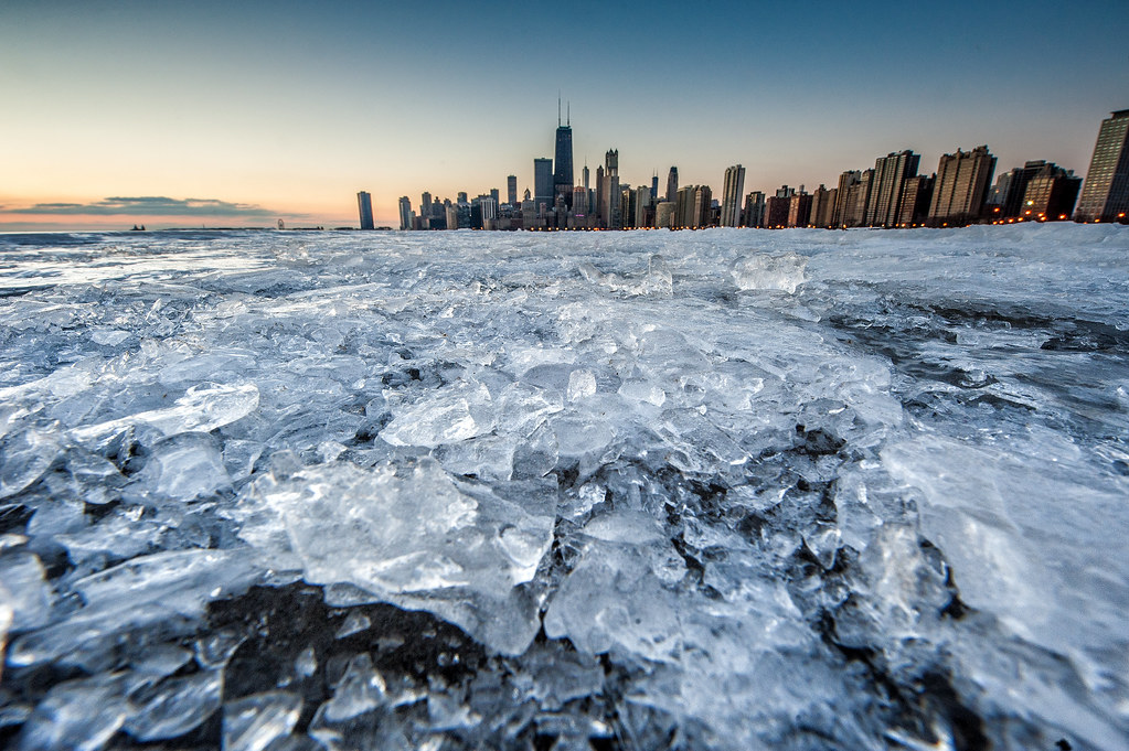 Broken ice on the North Ave. Beach Jetty with the Chicago Skyline in the background.