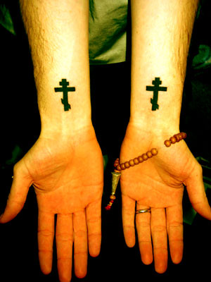 cross tattoos on wrist. crosses tattooed to my wrists