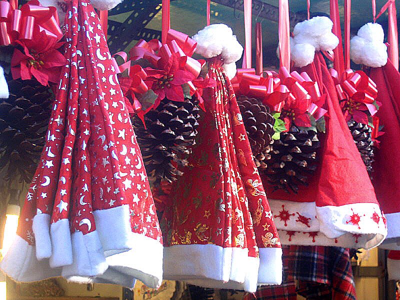 Santa's hats at Sta Llucia Xmas Market.Barcelona. Catalunya.December 2005