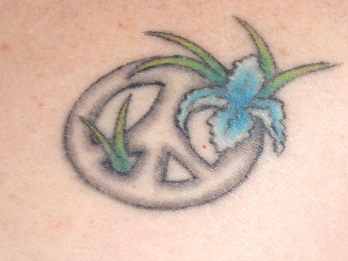Peace Iris Tattoo by Hotash From Hotash