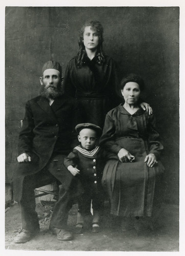 Chaim & Raisel Murofchick, with two of their children