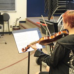 Student playing violin.