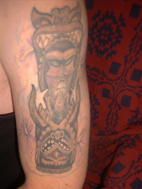 Tiki Totem Pole. I think this was Eric's second tattoo.