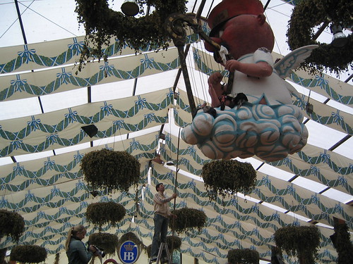 Articles Of Clothing. In the tents at Oktoberfest, on the second day, everyone cheered as articles of clothing were removed from the decorations hanging from the ceiling.