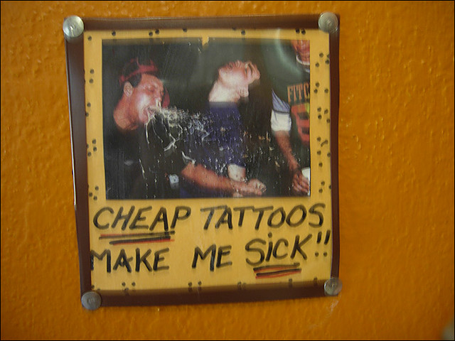 cheap tattoos. gully cat tattoos - say it and spray it.