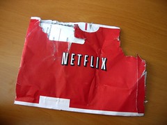 Netflix lowers subscriber forecast, shares fall