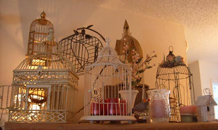 birdcages with candles